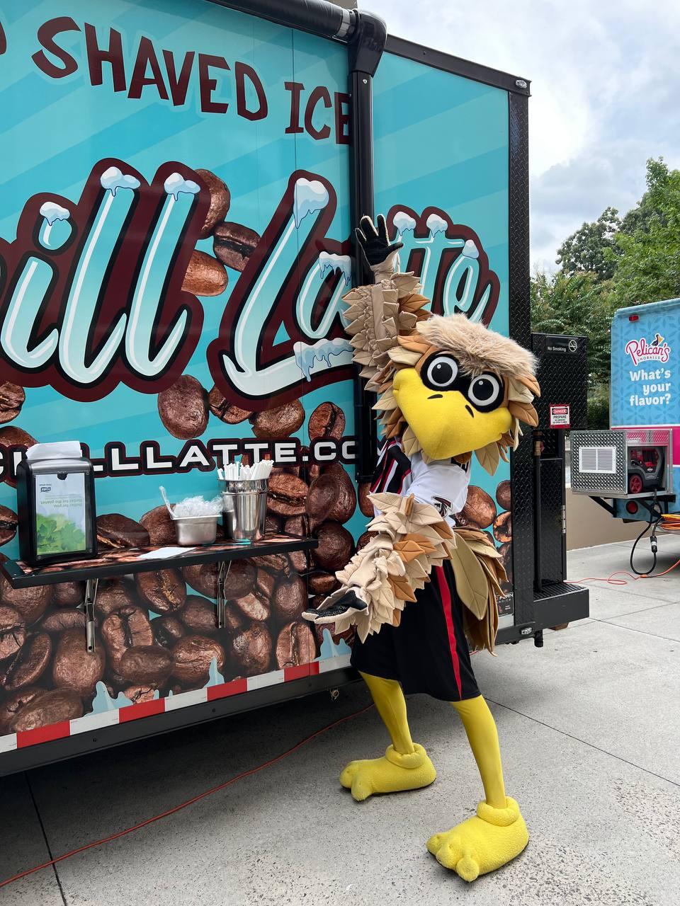 Falcon is posing in front of Chill Latte trailer 