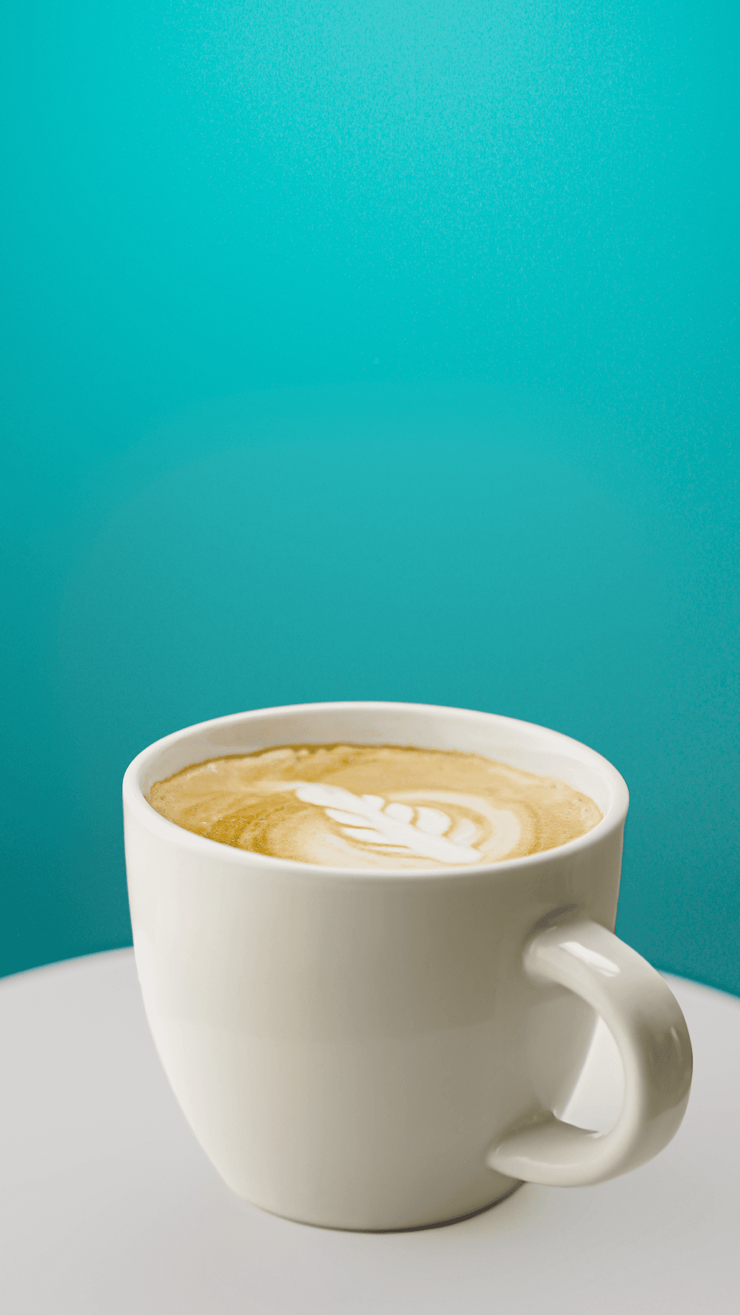 a cup with hot latte 